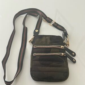 Camo crossbody bag like new and never used with three zippered compartments